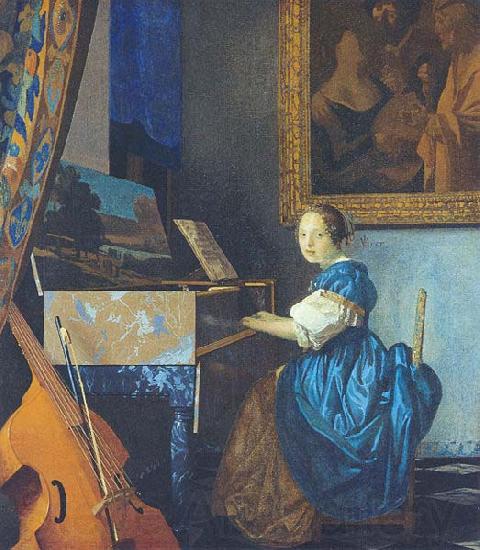 Johannes Vermeer A Young Woman Seated at the Virginal with a painting of Dirck van Baburen in the background